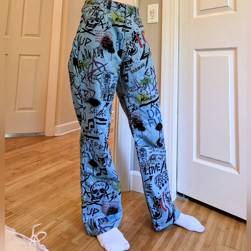 Loose fitting graffiti print jeans